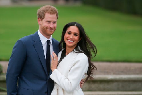 Britain's Prince Harry and his fiancée US actress Meghan Markle pose for a photograph in the Sunken ...
