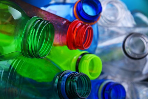 Empty colored carbonated drink bottles. Plastic waste