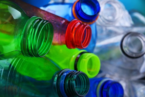 Empty colored carbonated drink bottles. Plastic waste