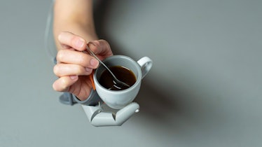 robot thumb holding tea cup