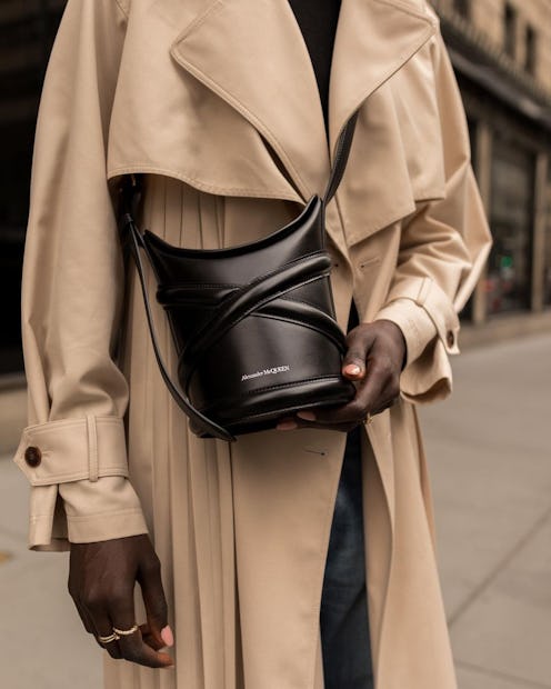 Blogger/digital creator Amy Julliette Lefévre wears a new Curve crossbody bag by Alexander McQueen.