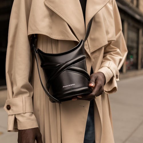 Blogger/digital creator Amy Julliette Lefévre wears a new Curve crossbody bag by Alexander McQueen.