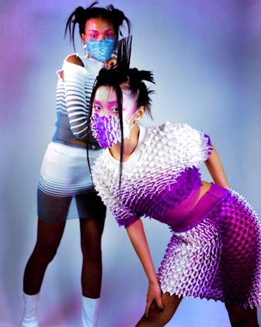 Two models in knitwear mini dresses 