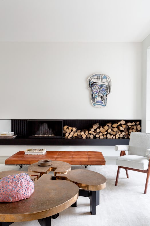 home interior, coffee table, chair, art