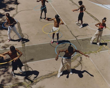 A photograph of people hula-hooping by Tyler Mitchell