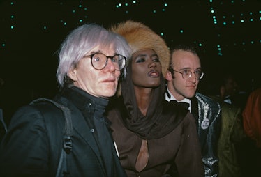 Graces Jones, Andy Warhol, and Keith Haring  attend the American Foundation for AIDS Research fundra...