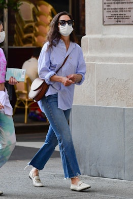 Grown up Suri Cruise steps out in a tie dye t-shirt and sweatpants for a walk with her mom, Katie Ho...