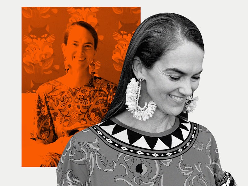 JJ Martin wearing a vintage printed dress from her label La DoubleJJ and vintage jewelry from chanel