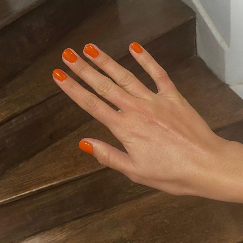 Blood orange nail polish is a choice of color for a summer season