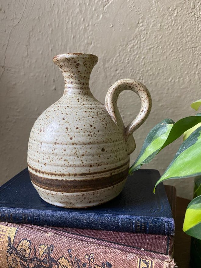 Vintage speckled handmade pottery bud vase with handle