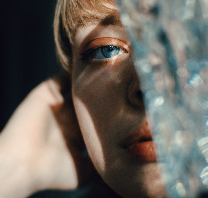 Young woman in the shadows during the May 2021 lunar eclipse.