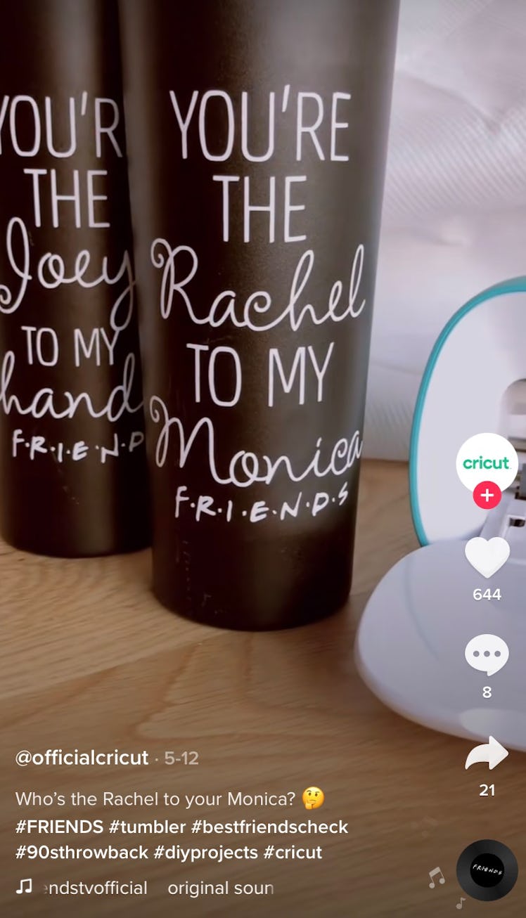 A pair of "You're the Monica to my Rachel" 'Friends' tumblers from Cricut's TikTok sit on the table....