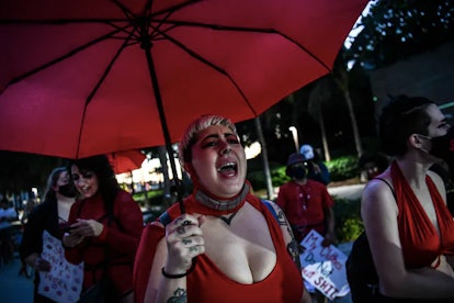 Activists and sex workers marched in Miami Beach in December 2020, seeking the decriminalization of ...