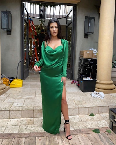 Kourtney Kardashian wearing a green Jean Paul Gautier gown.