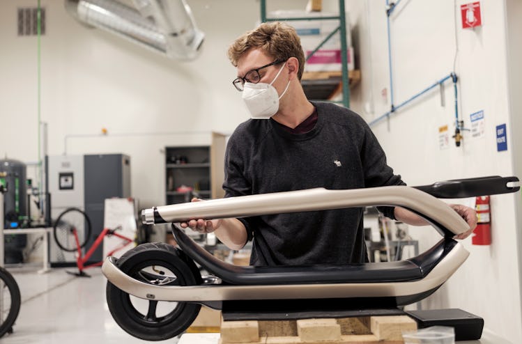 A Scotsman electric scooter being assembled.