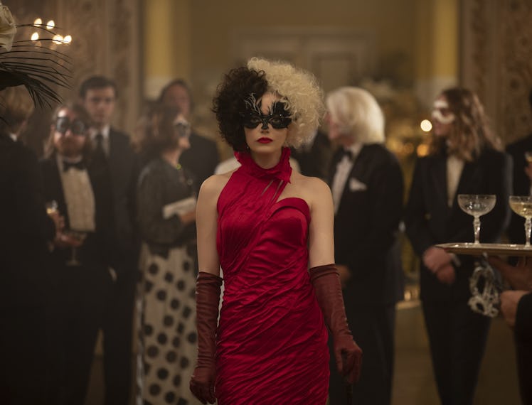 Emma Stone with black and white hair and red gown