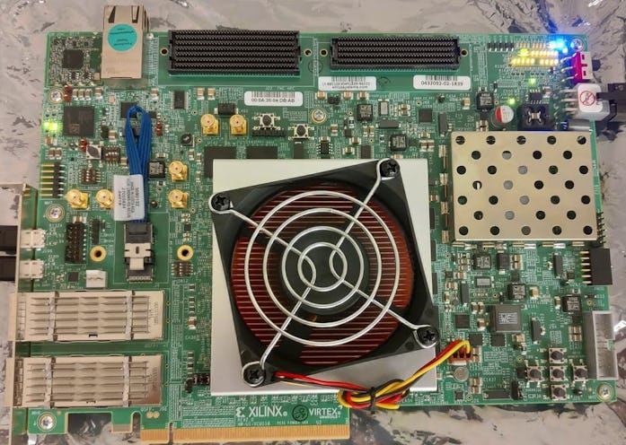 The Morpheus computer processor, inside the square beneath the fan on this circuit board, rapidly an...