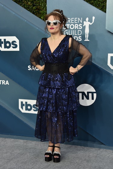 Helena Bonham Carter in a blue gown and silver sunnies