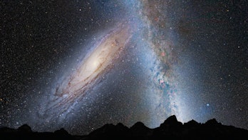 This illustration shows a stage in the predicted merger between our Milky Way galaxy and the neighbo...