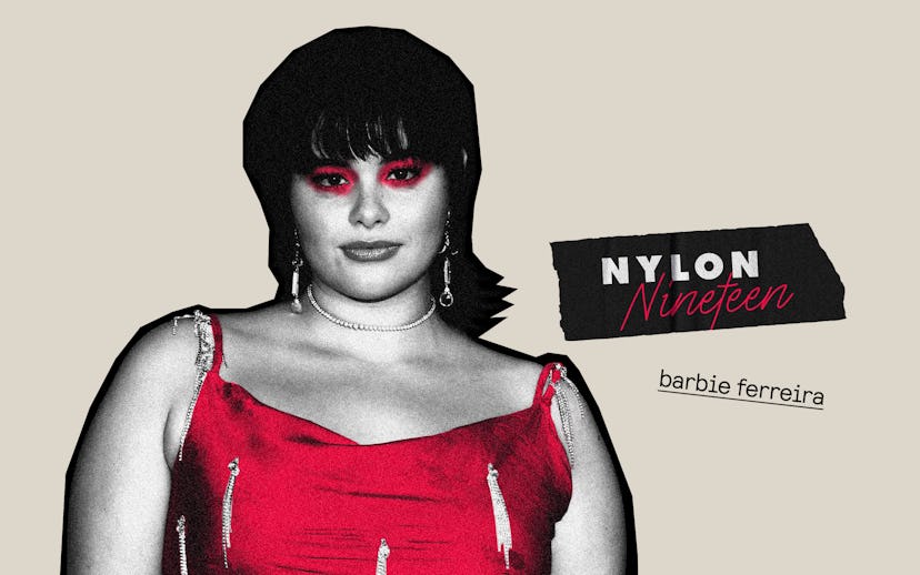 Barbie Ferreira emphasizes red color in a dress and eyeshadow