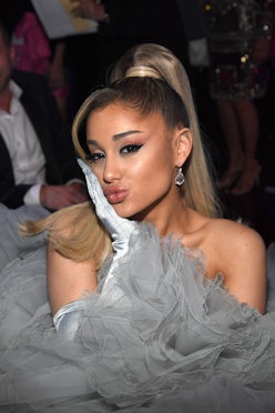 Ariana Grande wearing a gray dress from Giambattista Valli at the 62nd Annual Grammy Awards.