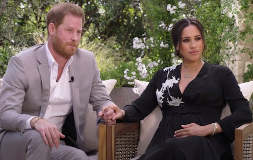 Harry and Meghan during their oprah interview sat against a backdrop of greenery, with harry wearing...