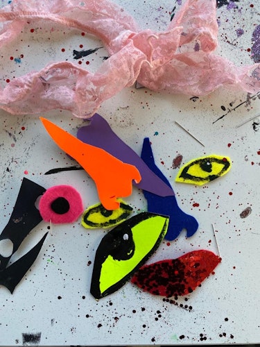 Christopher Kane's cutouts of eyes and lips for his artwork