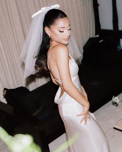 Ariana Grande wore a custom strapless wedding dress by Vera Wang.