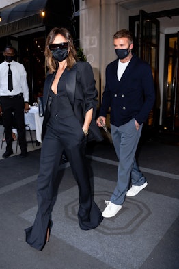 Victoria Beckham wears black tuxedo jacket and pants while out to dinner with David Beckham in New Y...