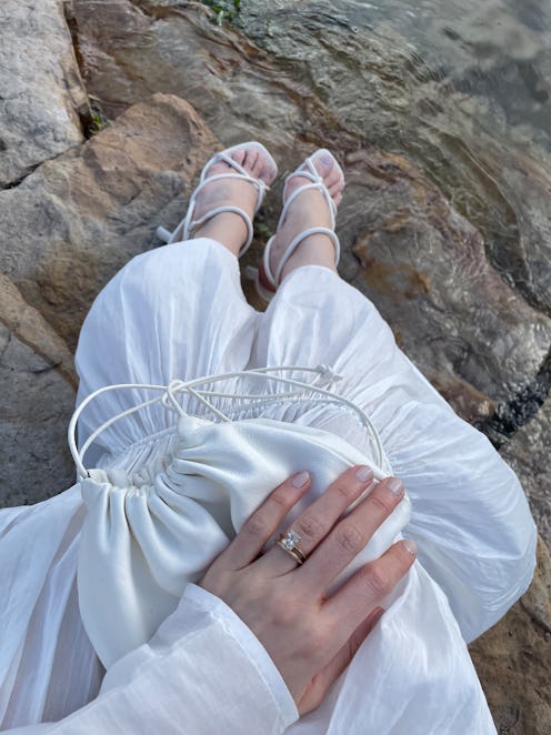 A white leather mini bag by Porto.