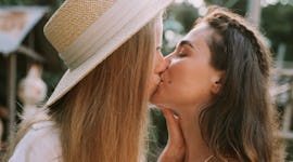 Young couple kissing on the most romantic day of June 2021.