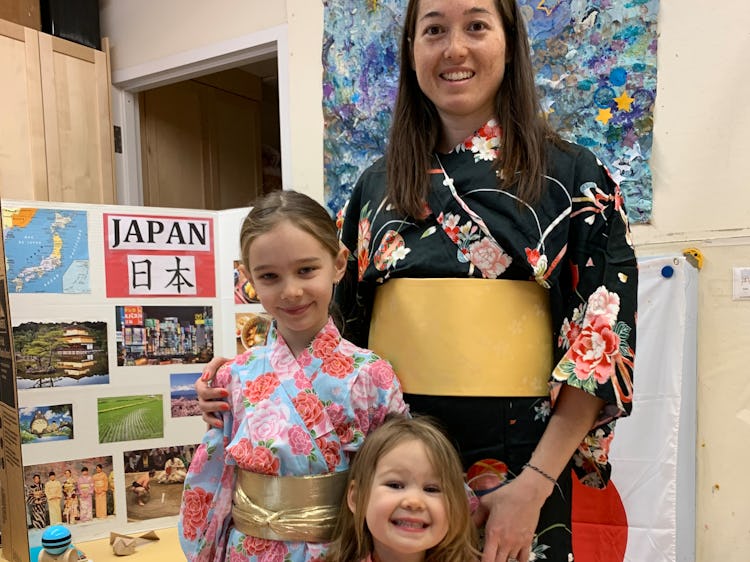 The author and her two young daughters; all are wearing kimonos.