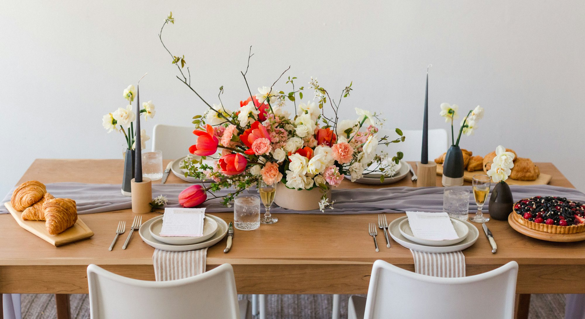 beautiful table spread with pink pink and white floral centerpiece