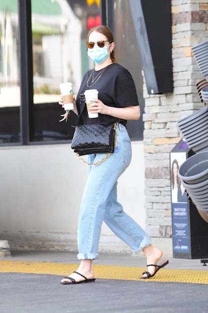 Actress and new mom Emma Stone makes a morning coffee run In Pacific Palisades and leaves with two l...