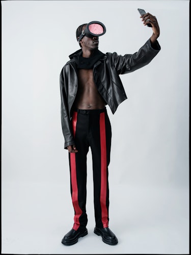 Unknown T wears a Maximilian jacket, pants, and hood; Nasir Mazhar for Maximilian goggles; Giorgio A...