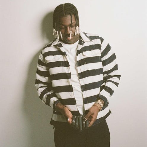 Lil Yachty holding his new nail polish, Crete.