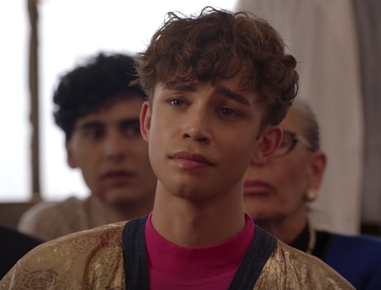 Jeremy McClain as Cubby wearing gold cardigan