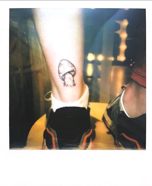 Ephemeral tattoo of a mushroom