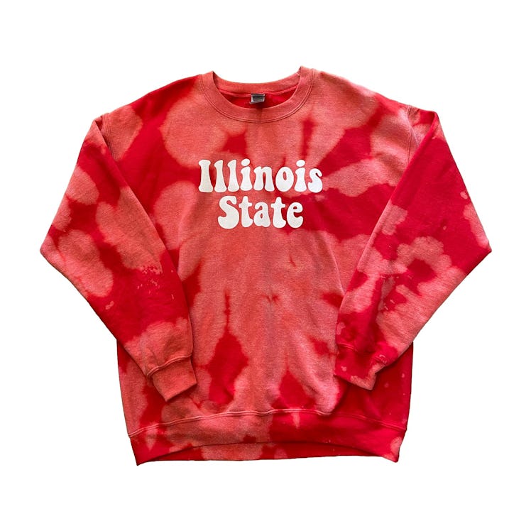 Etsy graduation gifts include this tie dye college sweatshirt that's customizable.