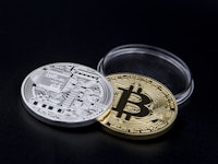 Silver and golden Bitcoin coins