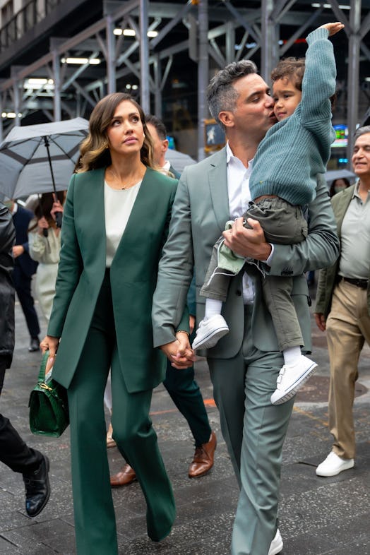 Jessica Alba and family all in green.