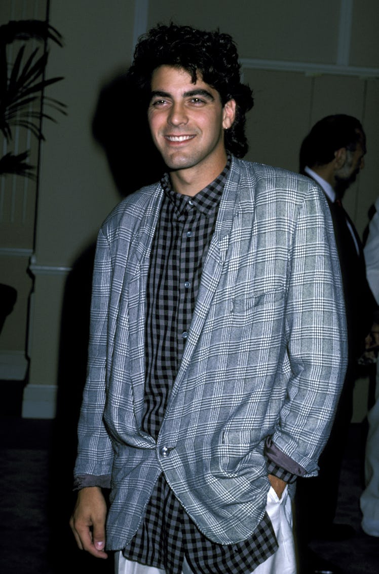 George Clooney in a loose blue suit