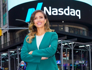 Jessica Alba in a green power suit at Nasdaq. 