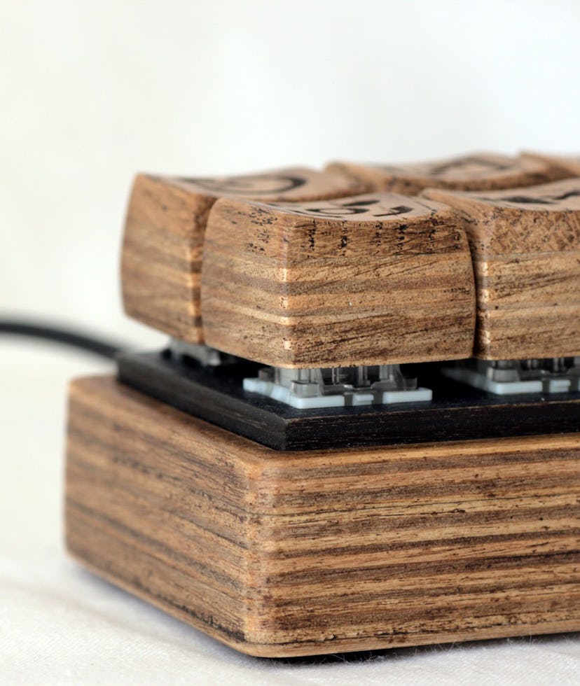 This custom mechanical keyboard is made of wood.