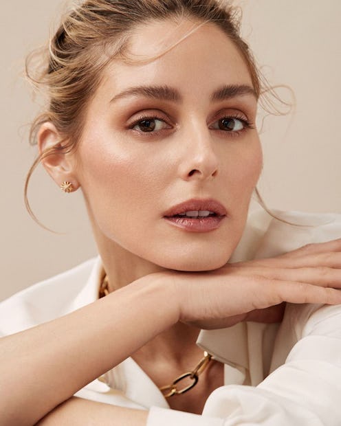 portrait of Olivia Palermo wearing her beauty line
