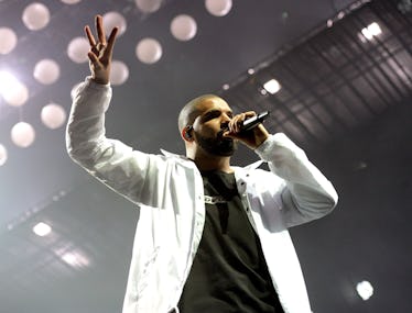 Drake performing onstage