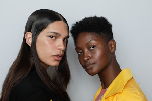 models backstage at fashion week