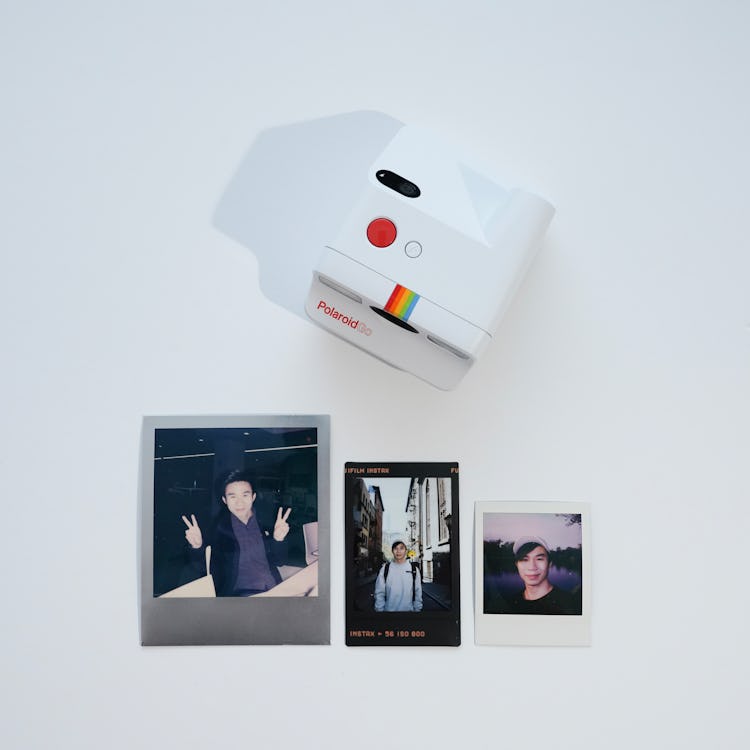Polaroid Go review: Prints size comparison:  standard 600 size Polaroid, Fujifilm Instax Mini, and P...
