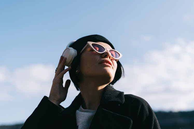 Young woman celebrating the May 2021 new moon