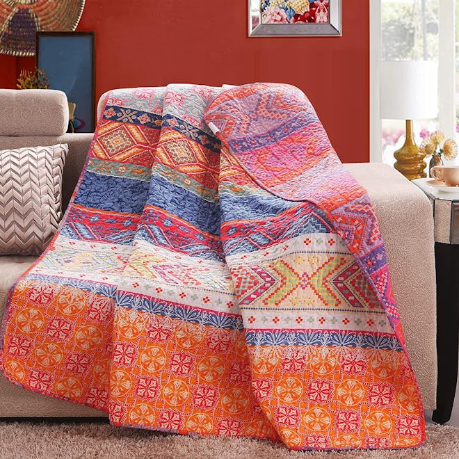 Exclusivo Mezcla Reversible Quilted Throw Blanket